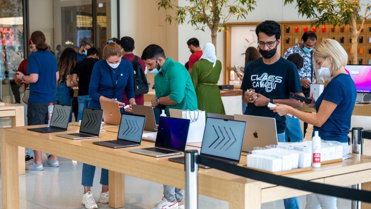 Customers at the Apple store in Dubai Mall. - KT file