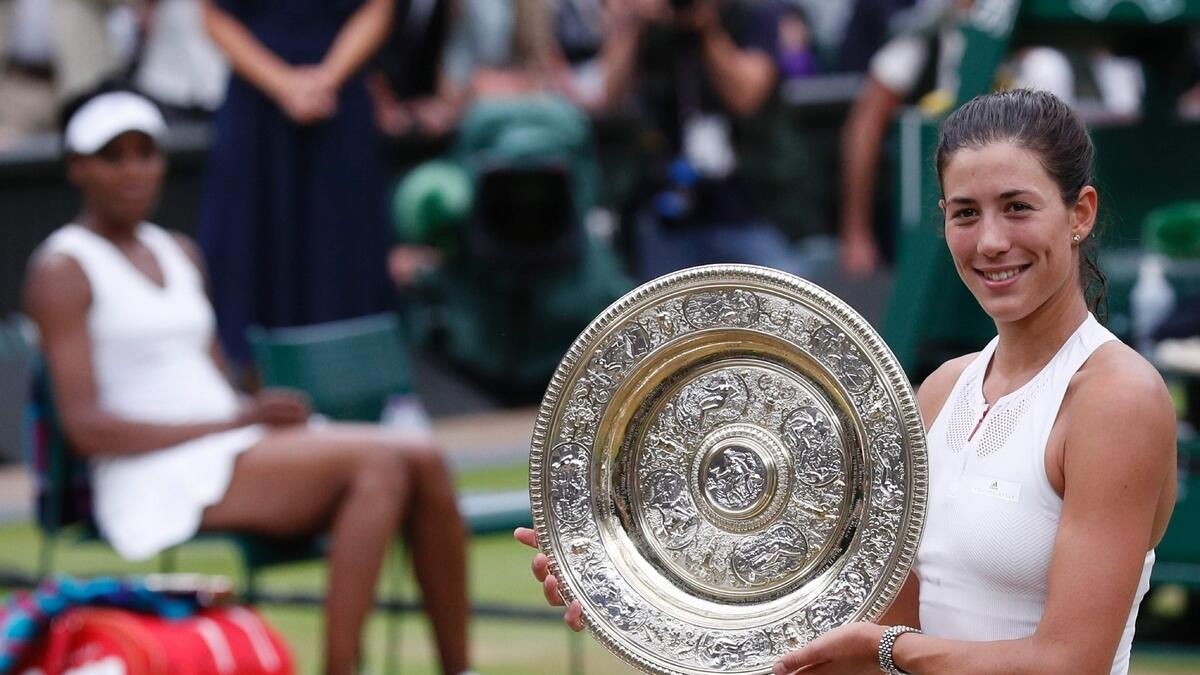 Magical Muguruza clinches Wimbledon title