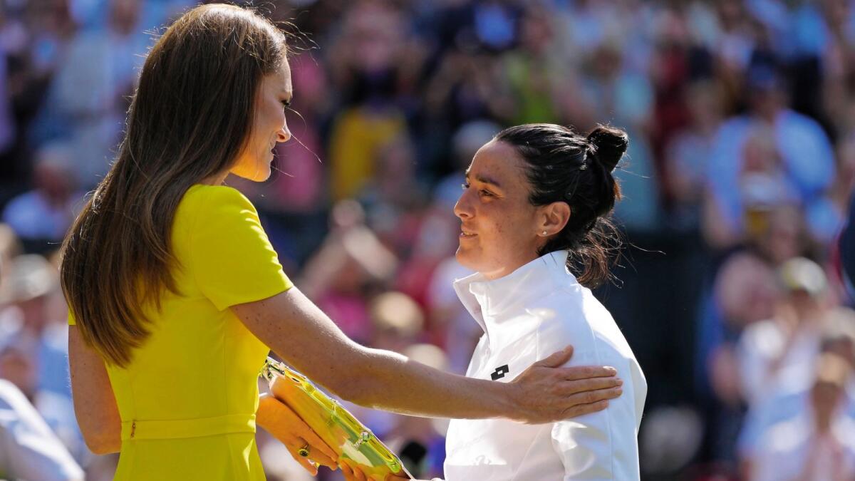 Britain's Kate, Duchess of Cambridge consoles Tunisia's Ons Jabeur after she lost to Kazakhstan's Elena Rybakina in the final of the Wimbledon women's singles match. –AP