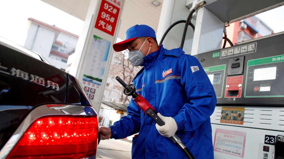 A Sinopec fuel station in Beijing, China. The IEA sees oil demand rising by 2 million barrels per day (bpd) in 2023, with China making up 900,000 bpd. — Reuters