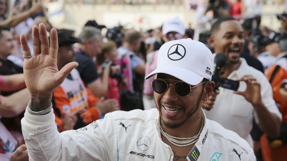 World champion Hamilton wins season-ending Abu Dhabi GP