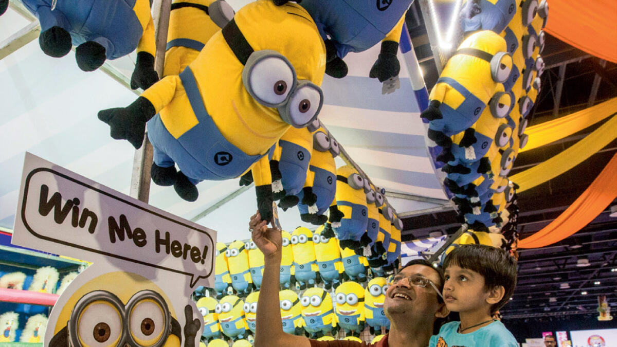 WIN A MINION ... A father selects a Minion for his son.