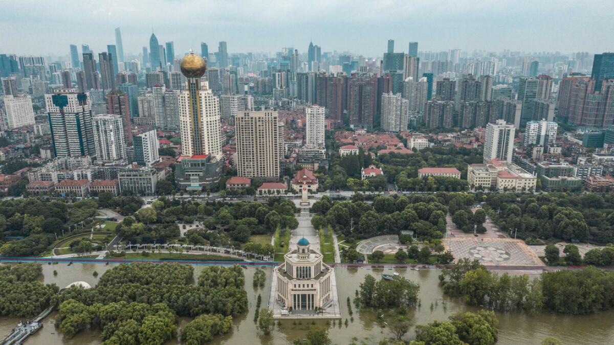 This aerial photo taken on July 12, 2020 shows a closed park due to the high water level of the Yangtze River in Wuhan in China's central Hubei province. Various parts of China have been hit by continuous downpours since June, with the damage adding pressure to a domestic economy already hit by the coronavirus pandemic. Photo: AFP