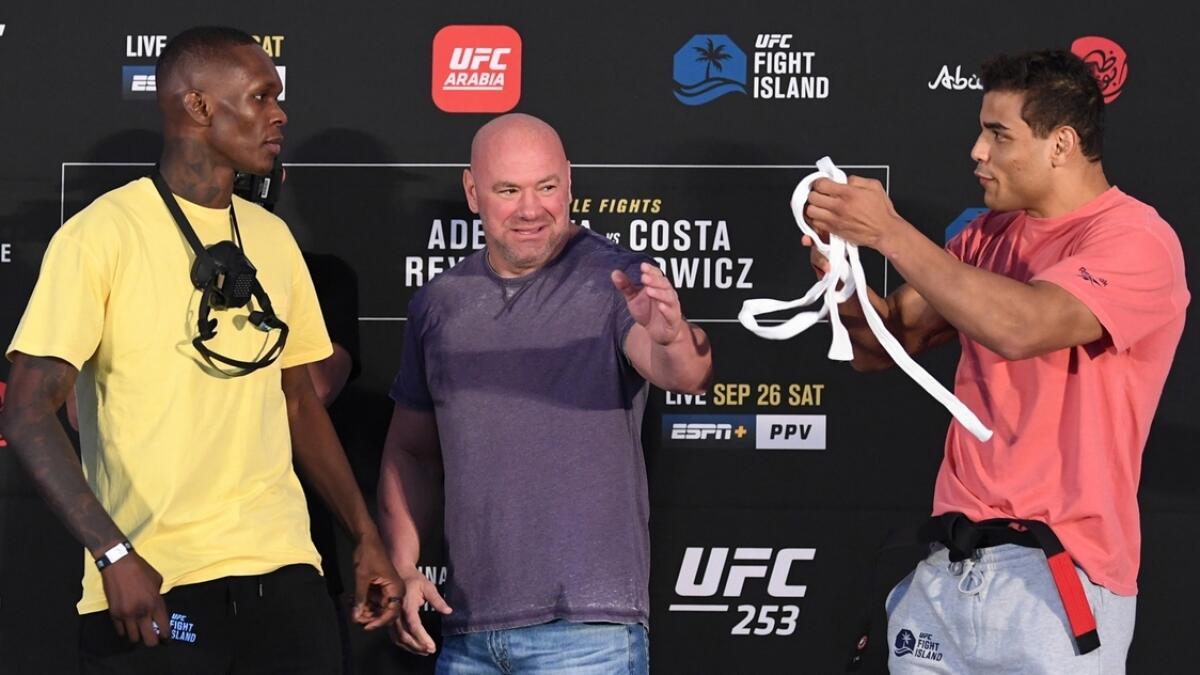 Israel Adesanya of Nigeria and Paulo Costa of Brazil face off during the UFC 253 weigh-in at UFC Fight Island, Abu Dhabi