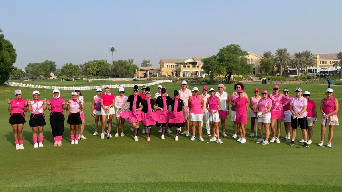 eams pose for the group photo prior to teeing off at Arabian Ranches Golf Club. - Supplied photo