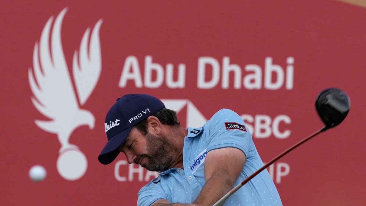 Scott Jamieson of Scotland tees off on the second hole during the third round of the Abu Dhabi Golf Championship. (AP)