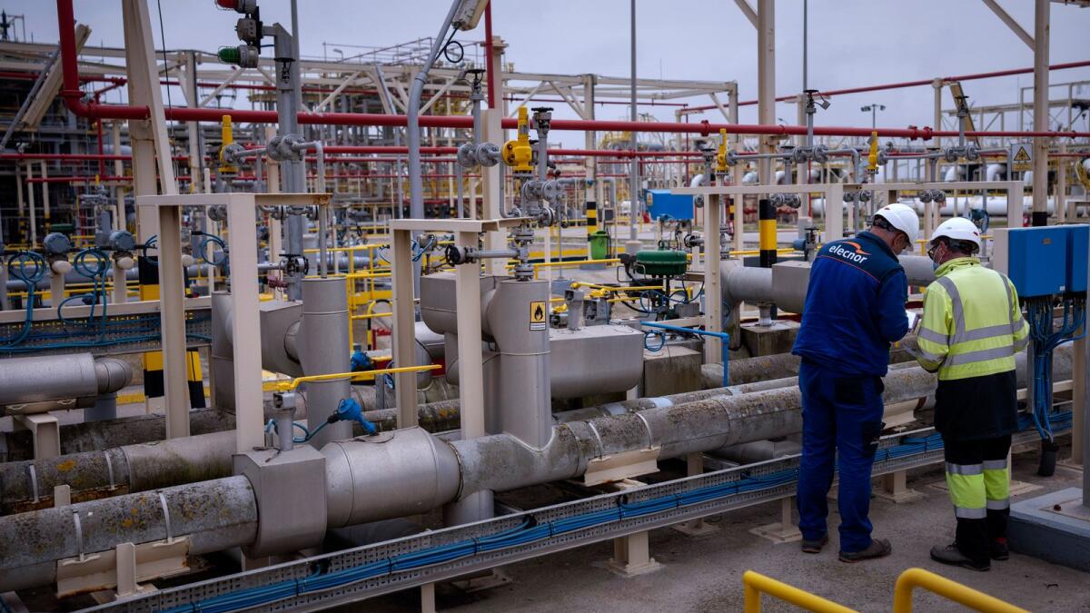 Operators work at Enagas regasification plant, the largest LNG plant in Europe, in Barcelona, Spain. — AP file photo