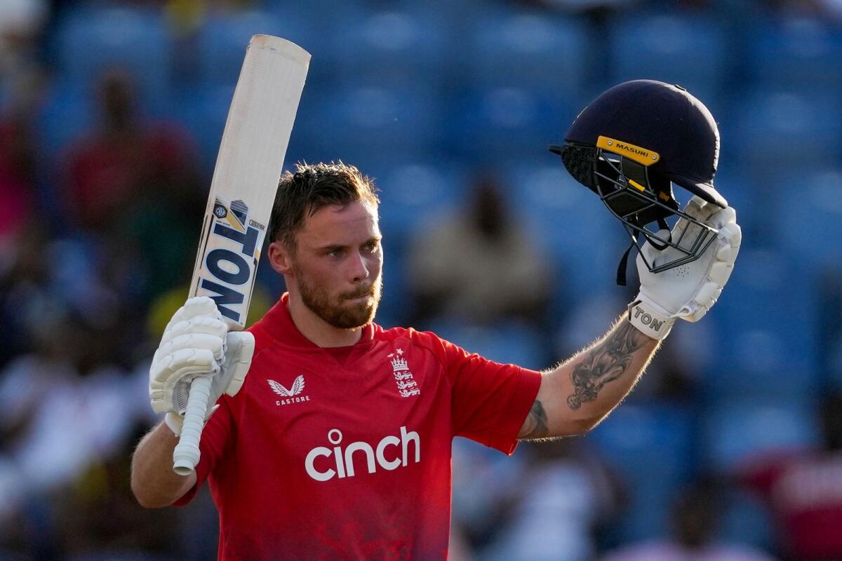 England's Phil Salt celebrates after he scored a century against the West Indiesduring the third T20 at the National Cricket Stadium in Saint George's, Grenada, on Saturday. - AP