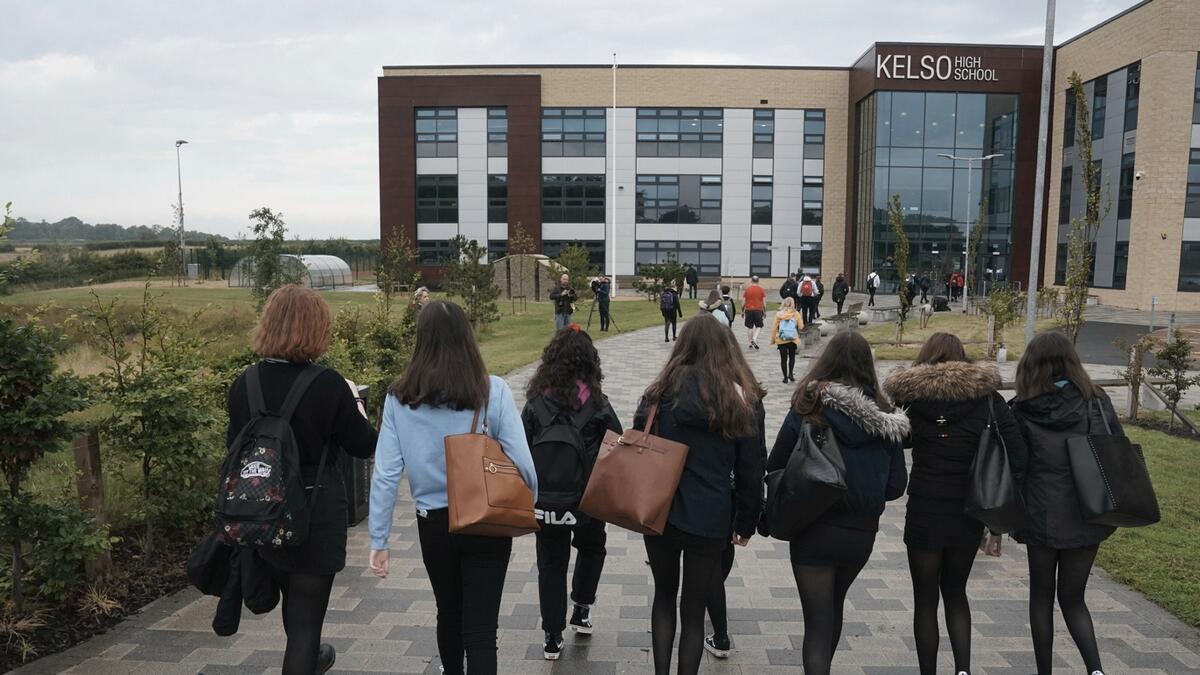 Pupils arrive at Kelso High School on the Scottish Borders as schools in Scotland started to reopen amid concerns about the safety of returning to the classroom in the midst of the coronavirus pandemic. Photo: AP