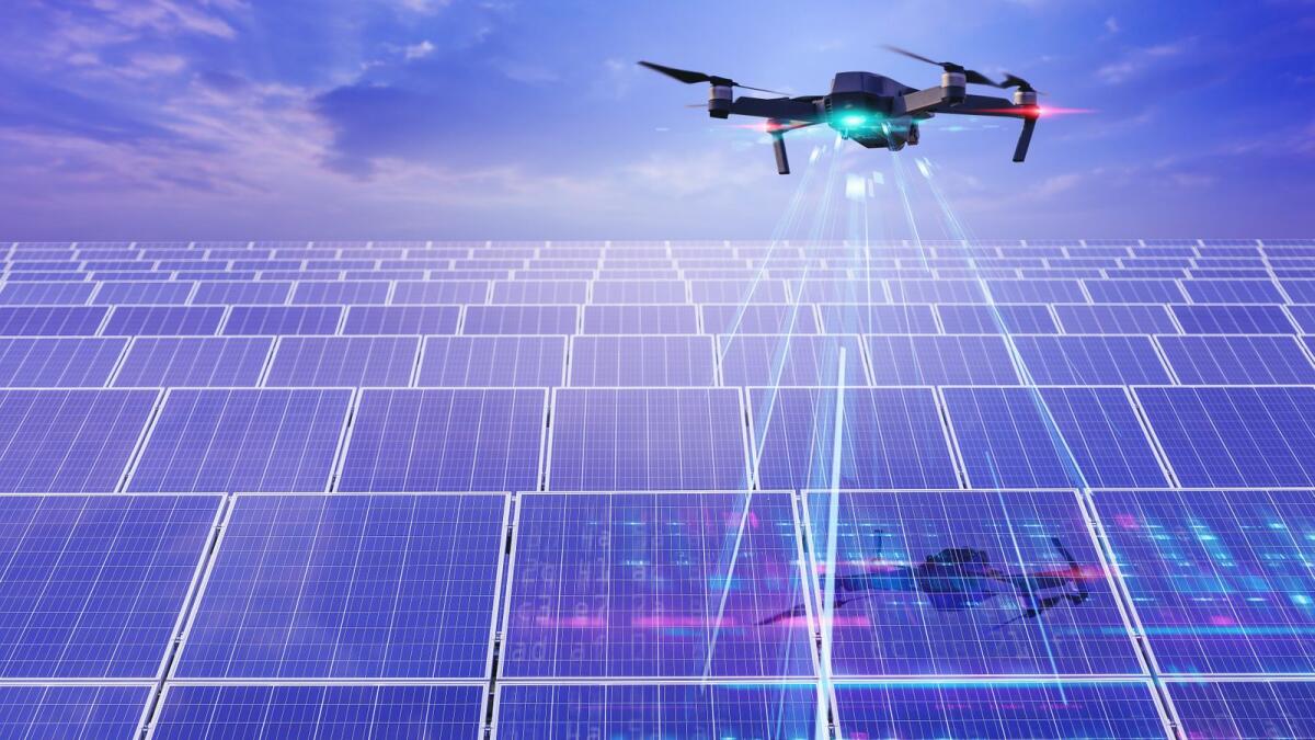 Flying drone inspection explores and making data for solar cell panel at solar farm with visual effect. Dewa uses UAVs to ensure solar photovoltaic panels are performing well. The new innovative system enables longer working hours for UAVs. — Supplied photo