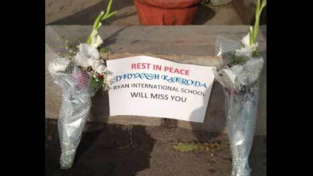 A flower memorial outside Ryan International School (Vasant Kunj, Delhi) in the memory of Divyansh Kakrora. Photo: ANI