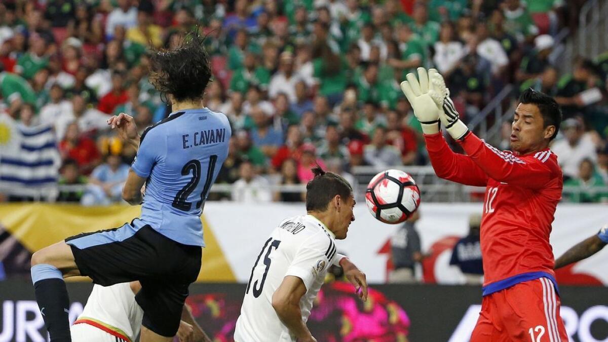 Two late goals give Mexico 3-1 win over Uruguay