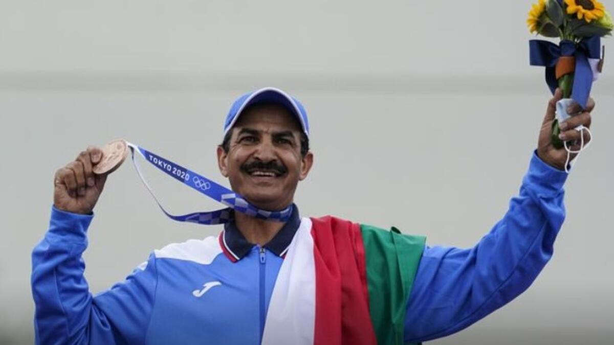 Abdullah Al Rashidi celebrates on the podium. (AP)
