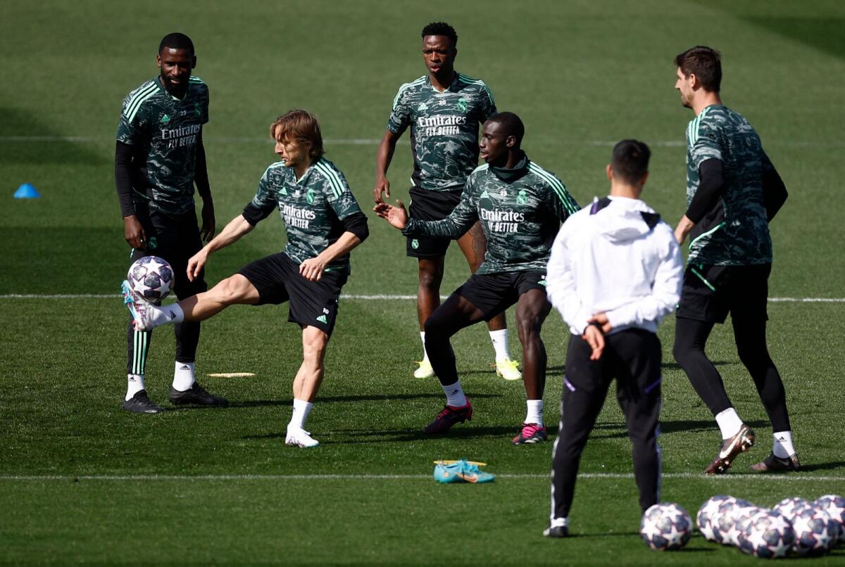 Real Madrid's Luka Modric controls the ball during a training session. — Reuters