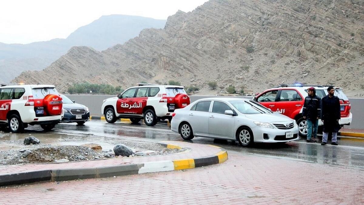 Ras Al Khaimah, Police, rainwater, roads, UAE, handle, 2,059, rain-related, reports, 2 days 