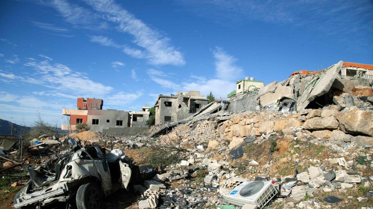 The rubble of a house destroyed in reported Israeli bombardment on December 13 litters the surrounding area in the southern Lebanese village of Kfar Kila. — AFP