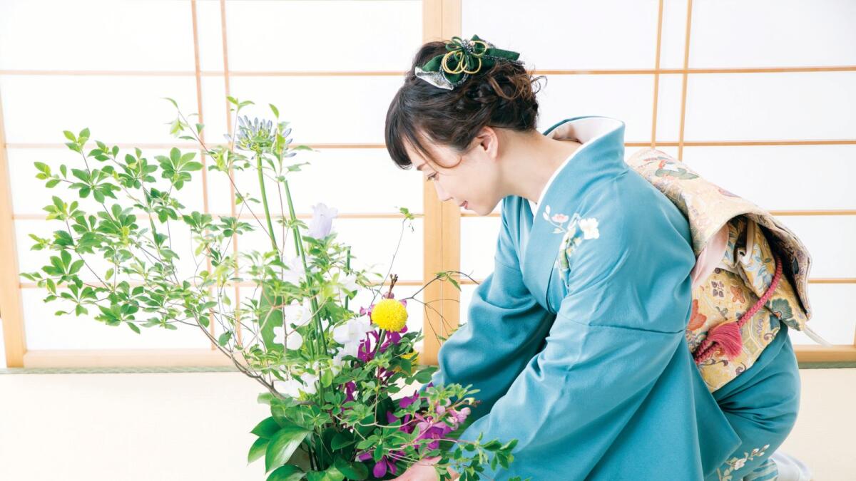 The woman who does flower arrangement.