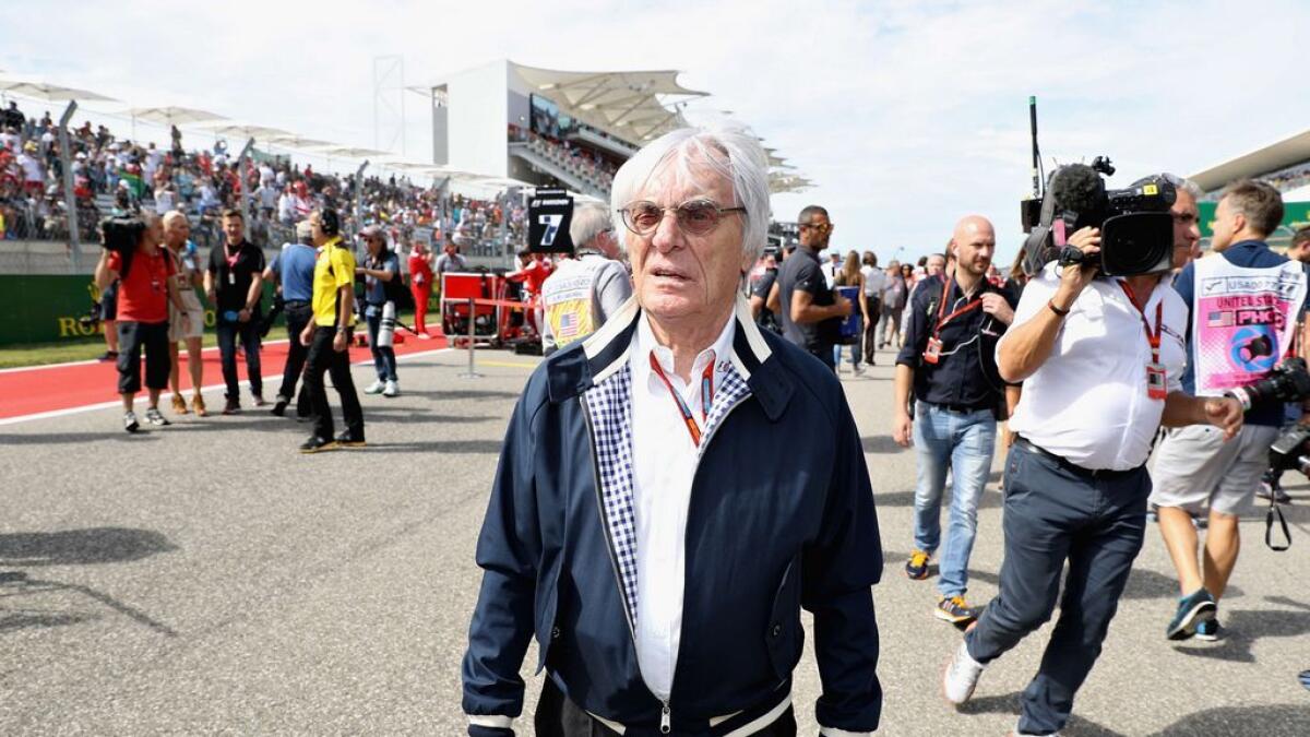 Ecclestone stands up for McLaren boss Dennis