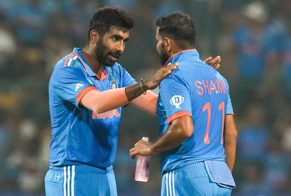 India's Jasprit Bumrah and Mohammed Shami during the ICC Men's Cricket World Cup match between India and Netherlands. Photo: PTI
