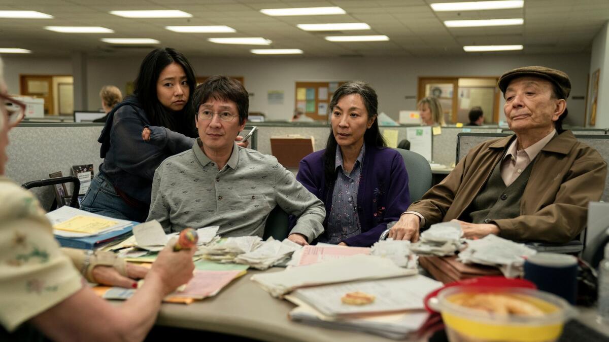 Stephanie Hsu, Ke Huy Quan, Michelle Yeoh and James Hong in a scene from 'Everything Everywhere All at Once'