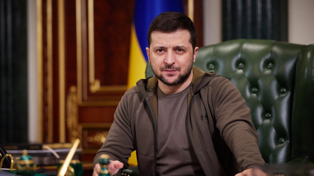 In this handout picture taken by the Ukrainian Presidency Press Office and released early on March 15, 2022, Ukrainian President Volodymyr Zelensky delivers a video address in Kyiv. Photo: AFP