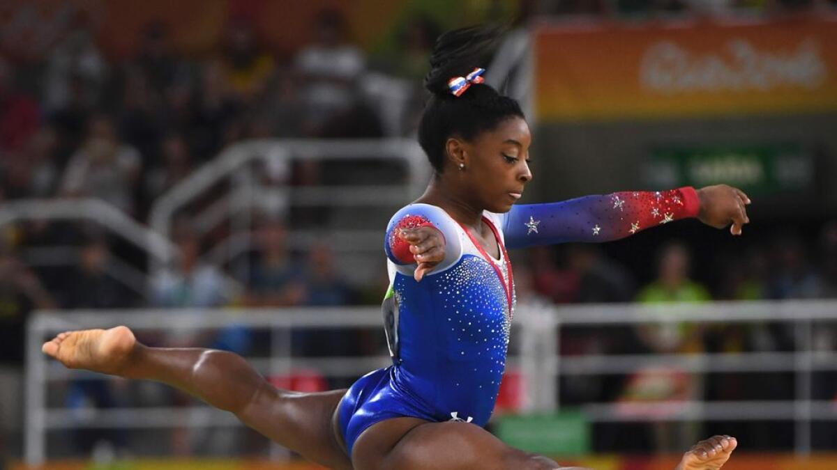 Biles bows out with four golds, name in lights