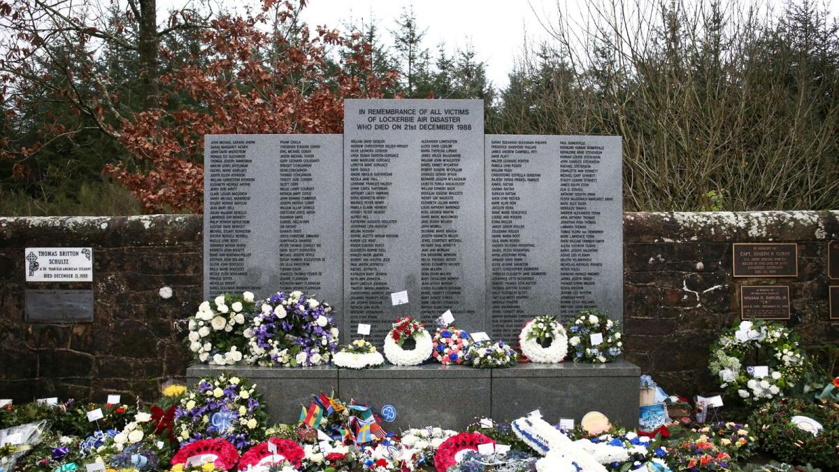 Floral tributes left at the Memorial Garden in Dryfesdale Cemetery are seen on the morning of the 30th anniversary of the bombing of Pan Am flight 103 which exploded over the Scottish town on December 21, 1988, killing 259 passengers and crew and 11 residents on the ground in Lockerbie, Scotland, Britain. — Reuters file