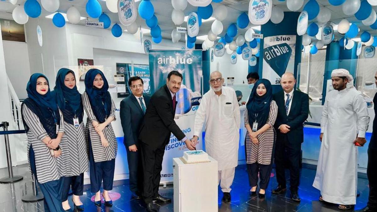 Chaudhary Mohammad Aslam and airblue’s country manager for the UAE Sohail Sheikh cutting cake to celebrate 18th anniversary of the airline. — Supplied photo 