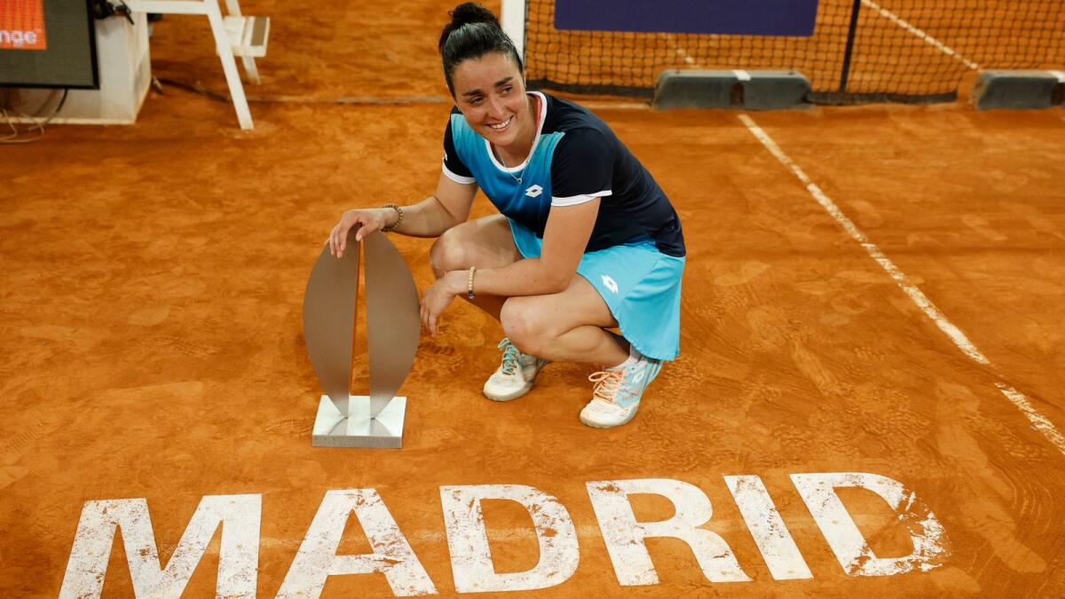 Tunisia's Ons Jabeur poses with the trophy after winning the Madrid Open. (Reuters)