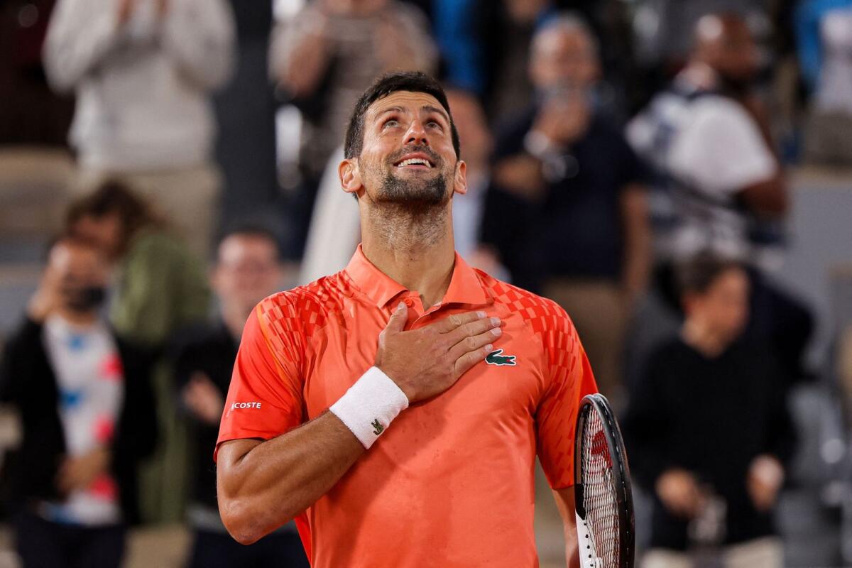 Serbia's Novak Djokovic celebrates after winning against Hungary's Marton Fucsovics. — AFP