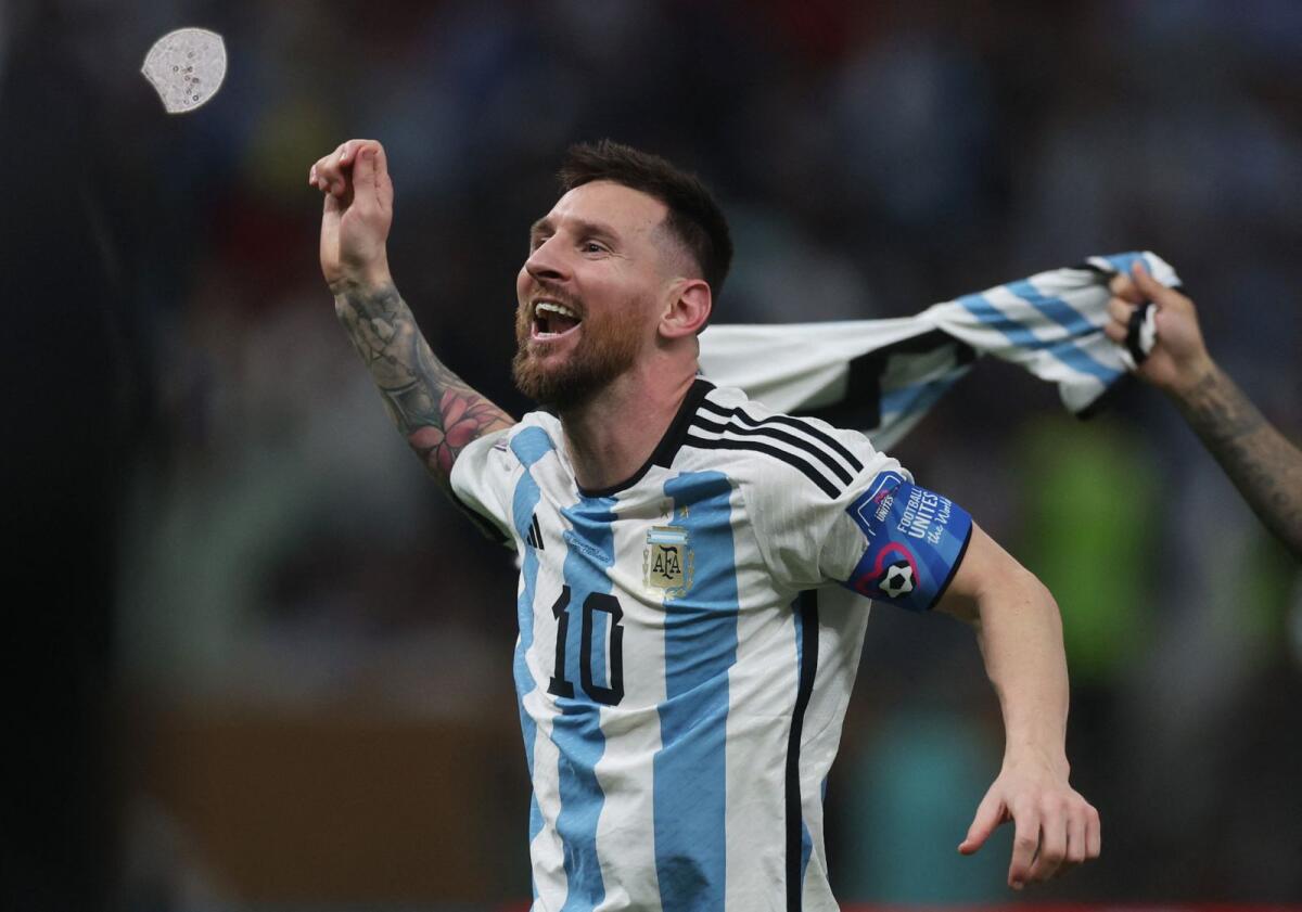 Argentina's Lionel Messi celebrates after winning the World Cup. Photo: Reuters