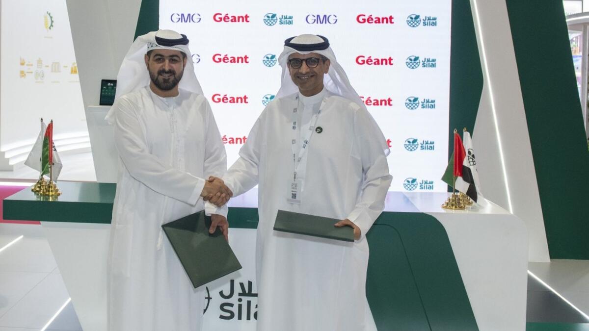 Mohammad A. Baker, Deputy Chairman and CEO of GMG (L) and Salmeen Obaid Alameri, CEO of Silal (R) at the MoU signing ceremony. - Supplied photo