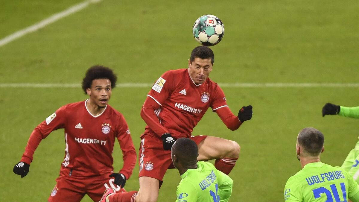 Bayern Munich's Robert Lewandowski scores his side's first goal - his 250th in the Bundesliga - on Wednesday evening.