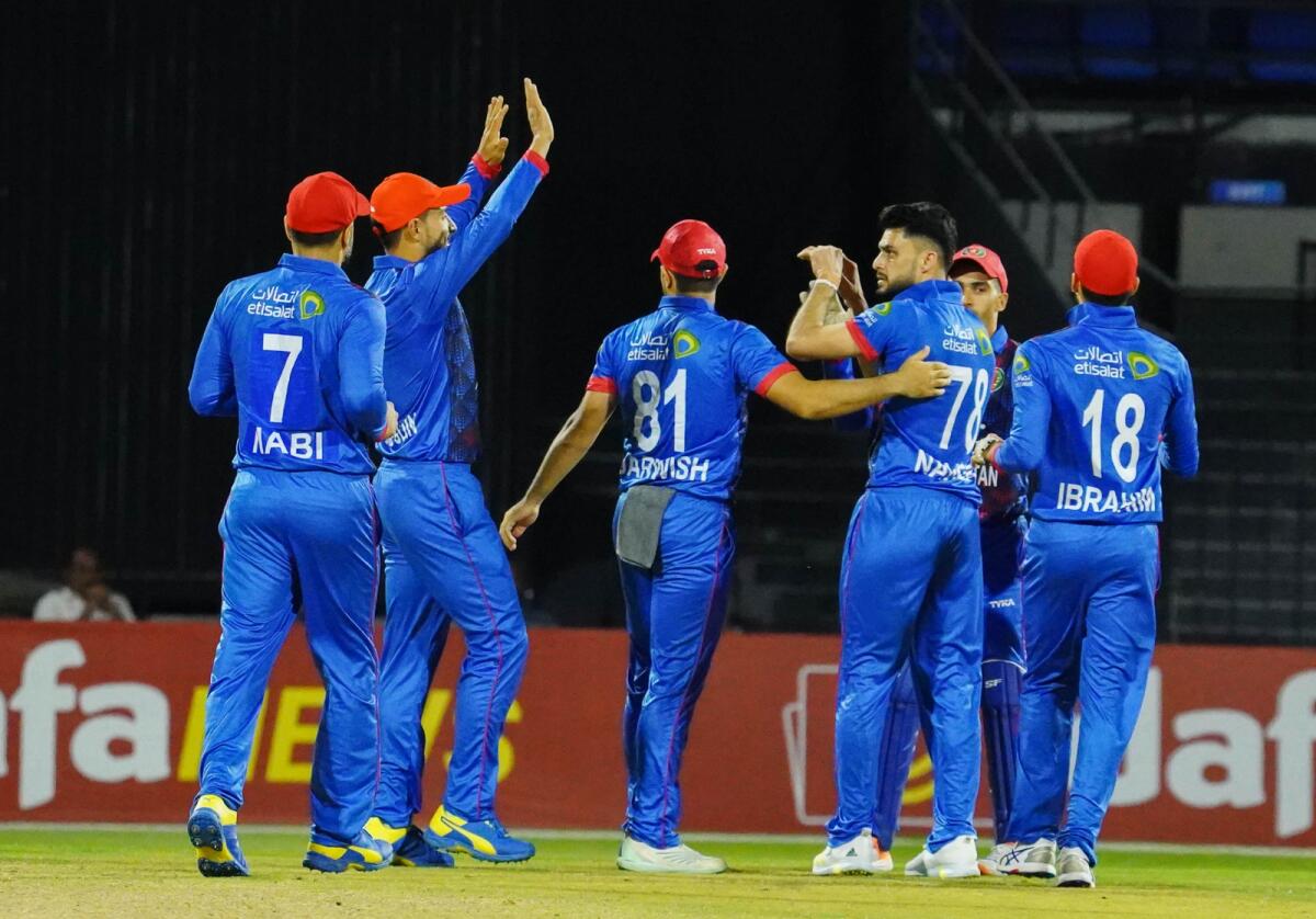 Afghanistan players celebrate a wicket against the UAE. — X