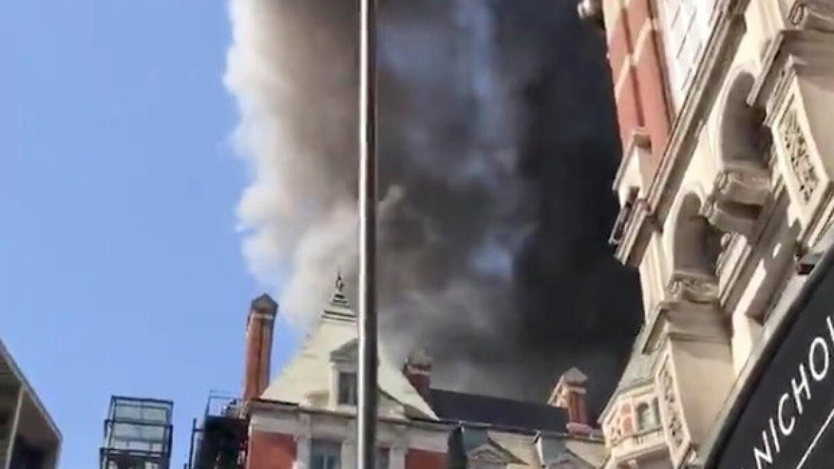 A blaze is seen at the Mandarin Oriental Hotel in Knightsbridge, London, Britain.- Reuters