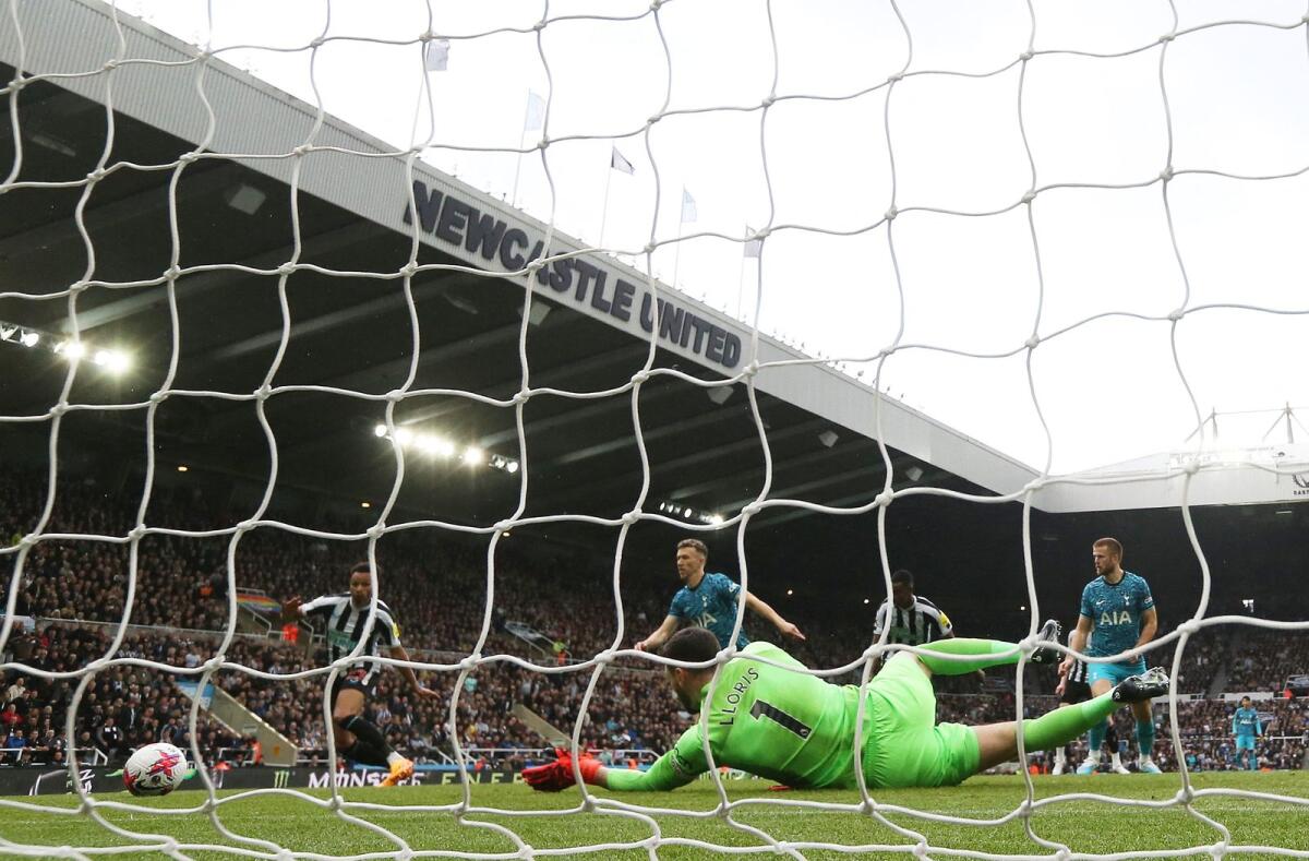 Newcastle United's Jacob Murphy scores the team's first goal past Tottenham Hotspur's Hugo Lloris. — Reuters