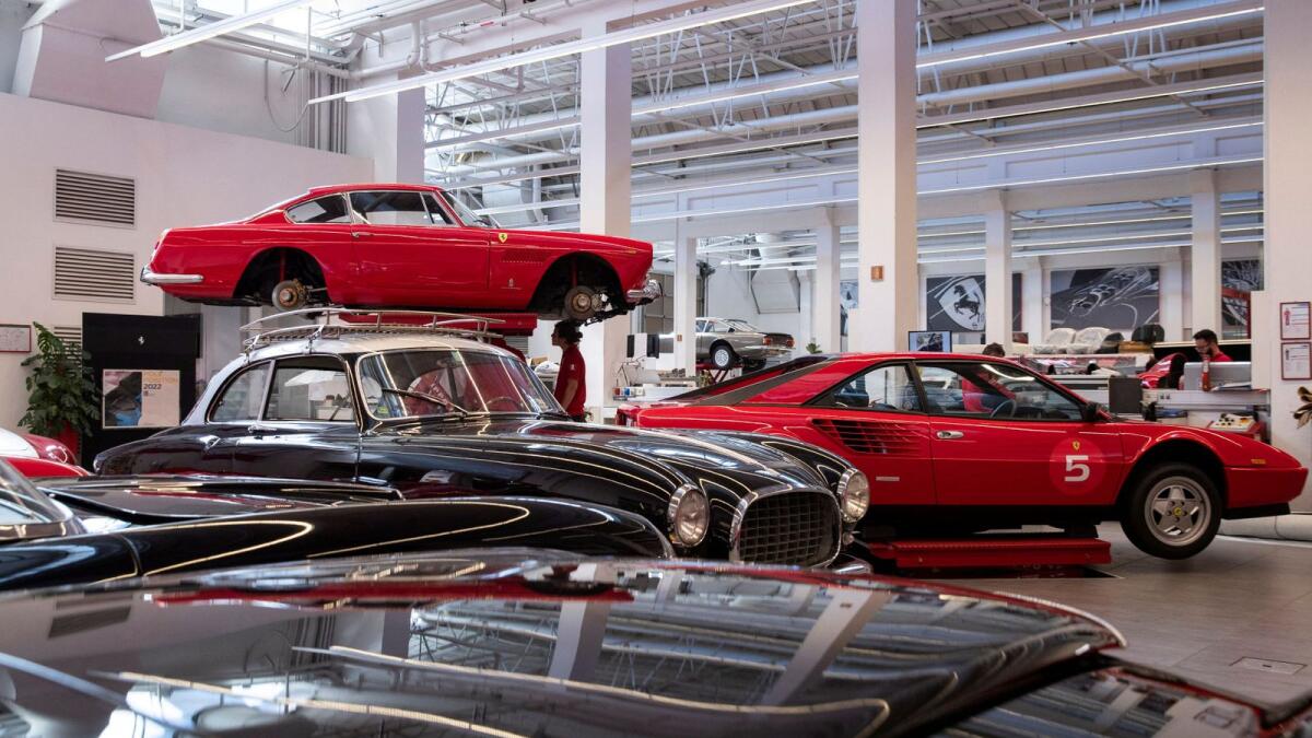 Ferrari Classiche cars are pictured in a garage at the Ferrari factory in Maranello, Italy. — Reuters
