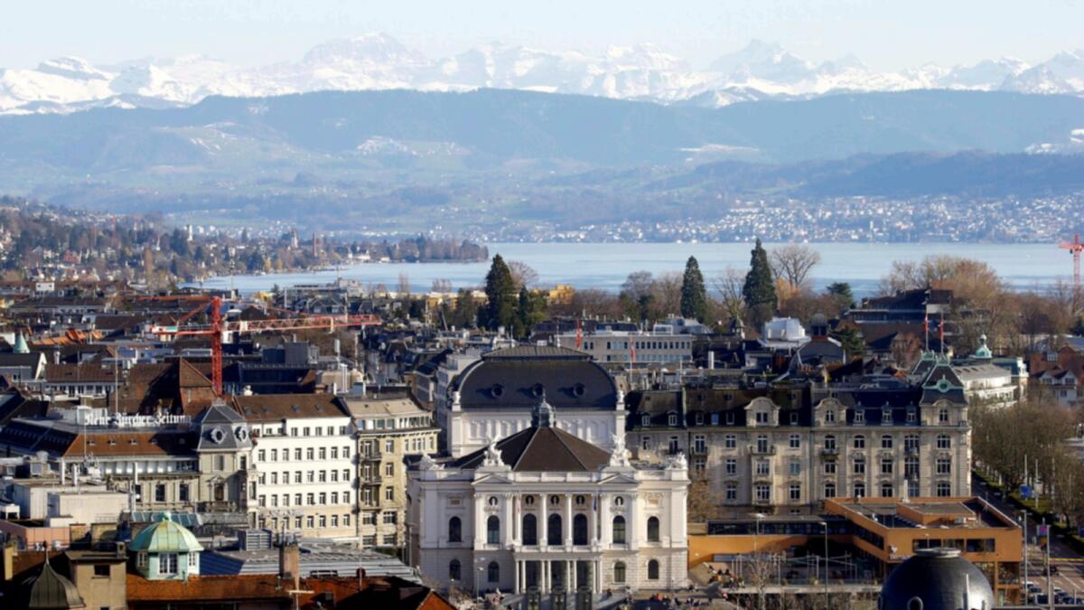 The eastern Swiss Alps and Lake Zurich behind the opera house in Zurich, Switzerland. — Reuters file