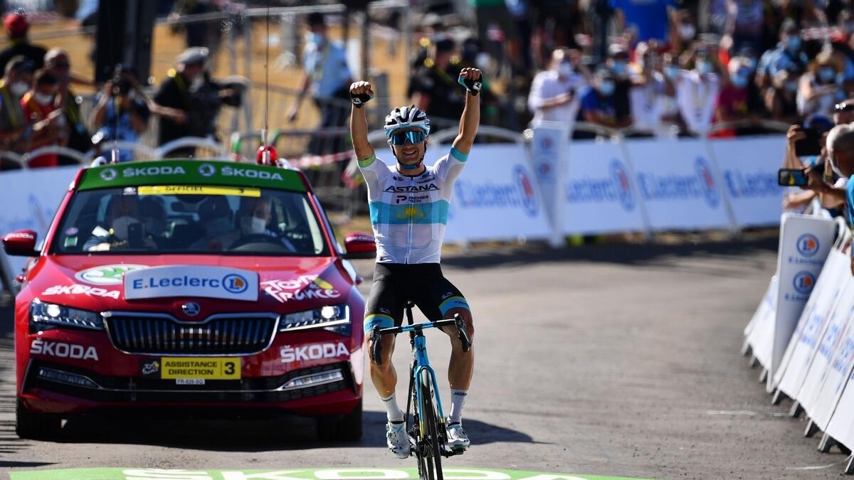 Team Astana rider Alexey Lutsenko celebrates as he crosses the finish line of the 6th stage of the 107th edition of the Tour de France. (AFP)