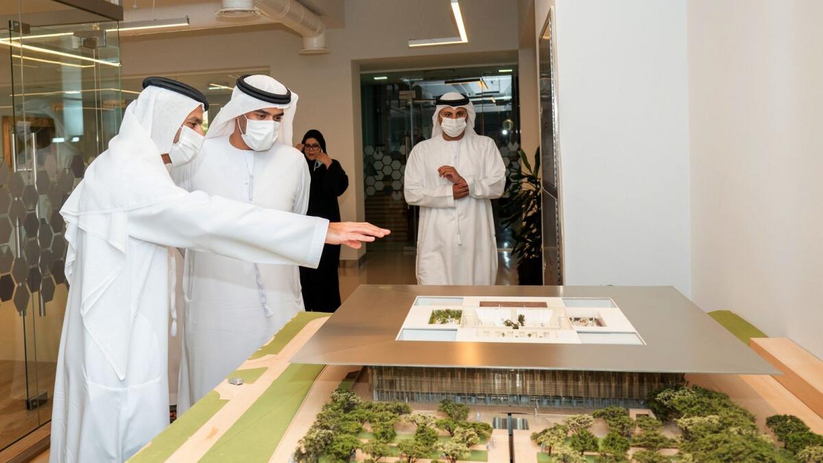 Mawran Al Sarkal and Obaid Al Tunaiji during a tour at Shurooq's headquarters