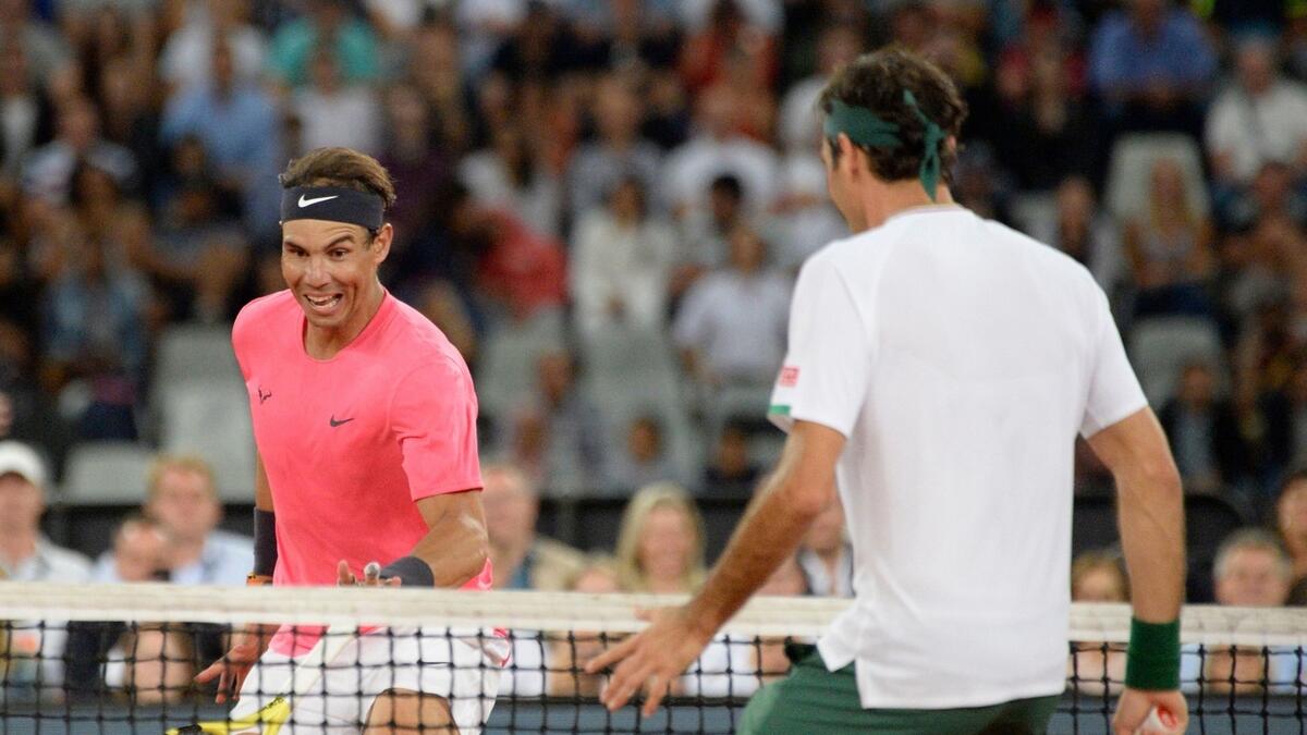 Federer, Nadal play draw record crowd in charity match