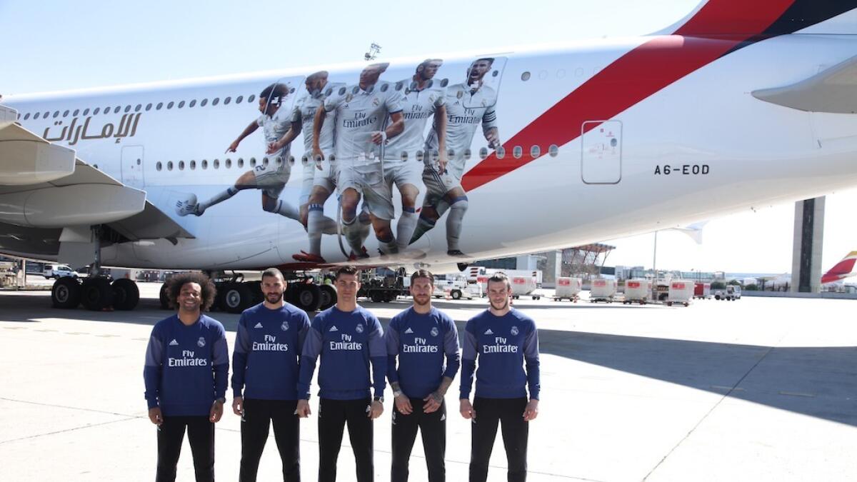 (L-R) Real Madrid players Marcelo, Karim Benzema, Cristiano Ronaldo, Sergio Ramos and Gareth Bale in front of the new Real Madrid Emirates A380 decal