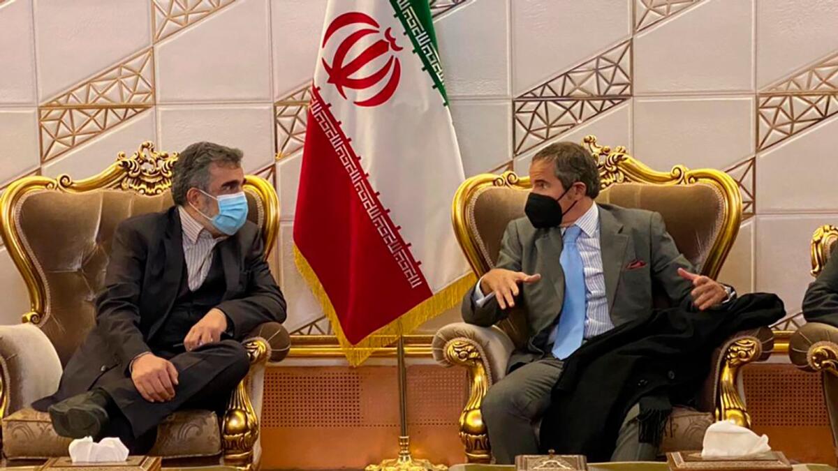 Director General of International Atomic Energy Agency, IAEA, Rafael Mariano Grossi, right, speaks with deputy head of the Atomic Energy Organisation of Iran Behrouz Kamalvandi in Tehran. – AP
