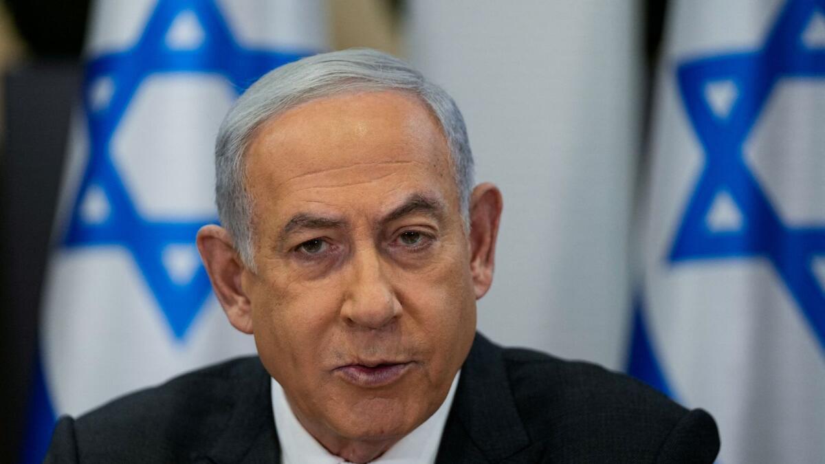 Israeli Prime Minister Benjamin Netanyahu chairs a cabinet meeting at the Kirya military base. — Reuters
