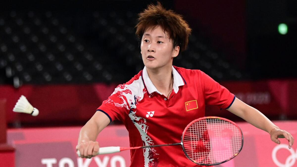 China's Chen Yufei hits a shot to Taiwan's Tai Tzu-ying in their women's singles badminton final match during the Tokyo 2020 Olympic Games. — AFP