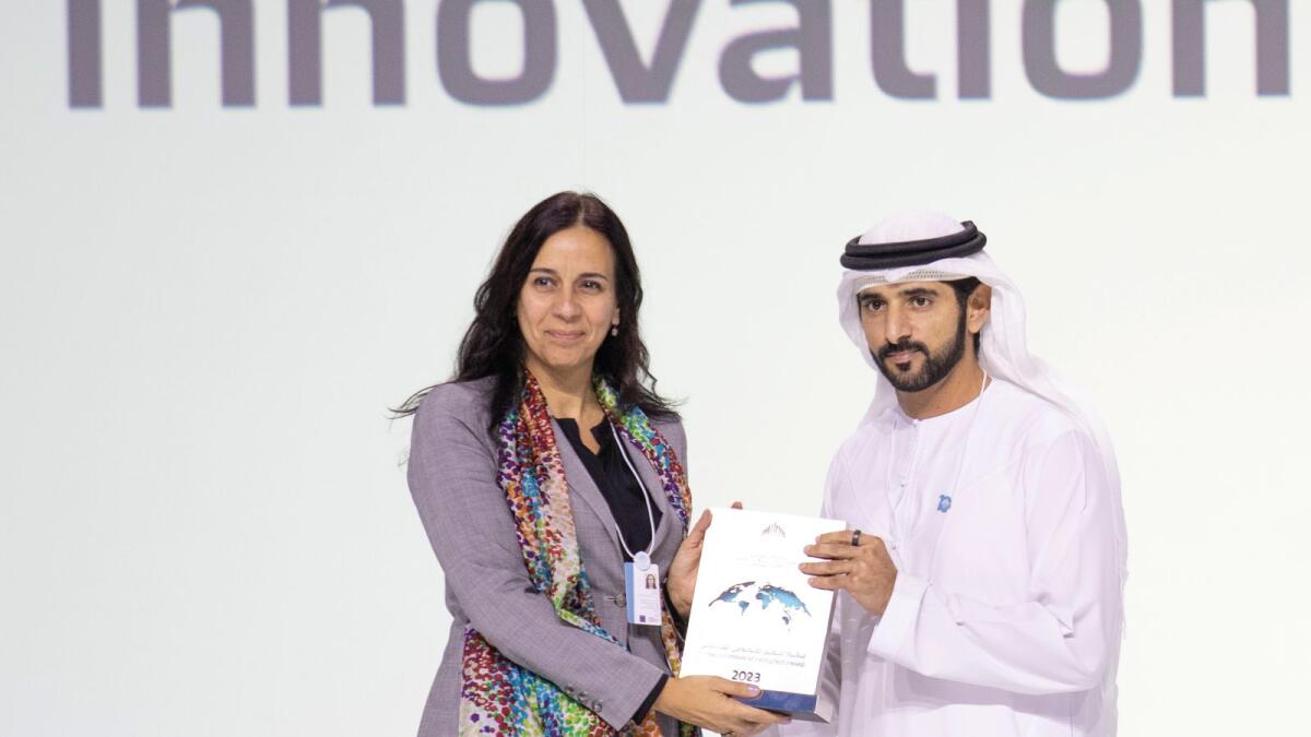 Sheikh Hamdan bin Mohammed bin Rashid Al Maktoum presents a award to LABX-centre for innovation in the public sector  University (Distinguished Initiative in Government Innovation) at the World Government Summit.  - Photo by Shihab