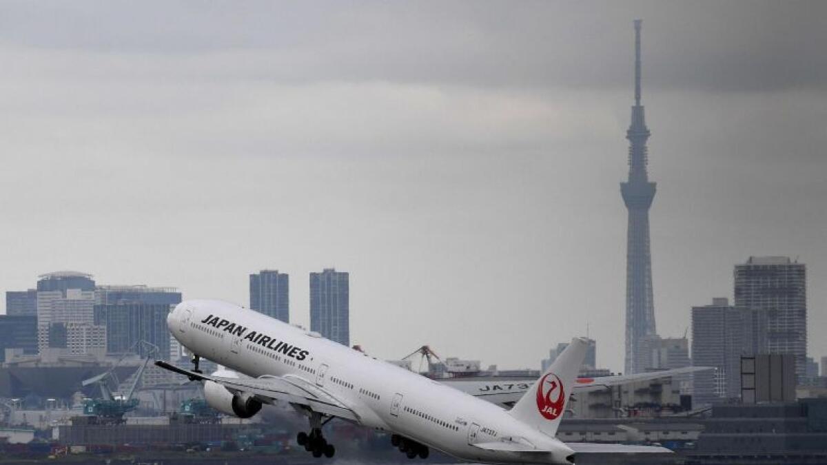 Japan Airlines plane makes emergency landing in Tokyo