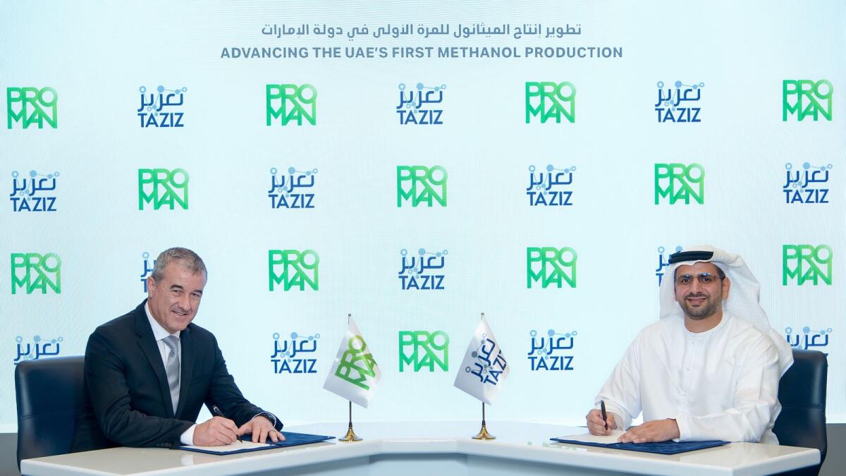Richard Brink, managing director Proman in the UAE, and Khaleefa Yousef Al Mheiri, Ta'ziz acting chief executive officer, signing the agreement. — Supplied photo