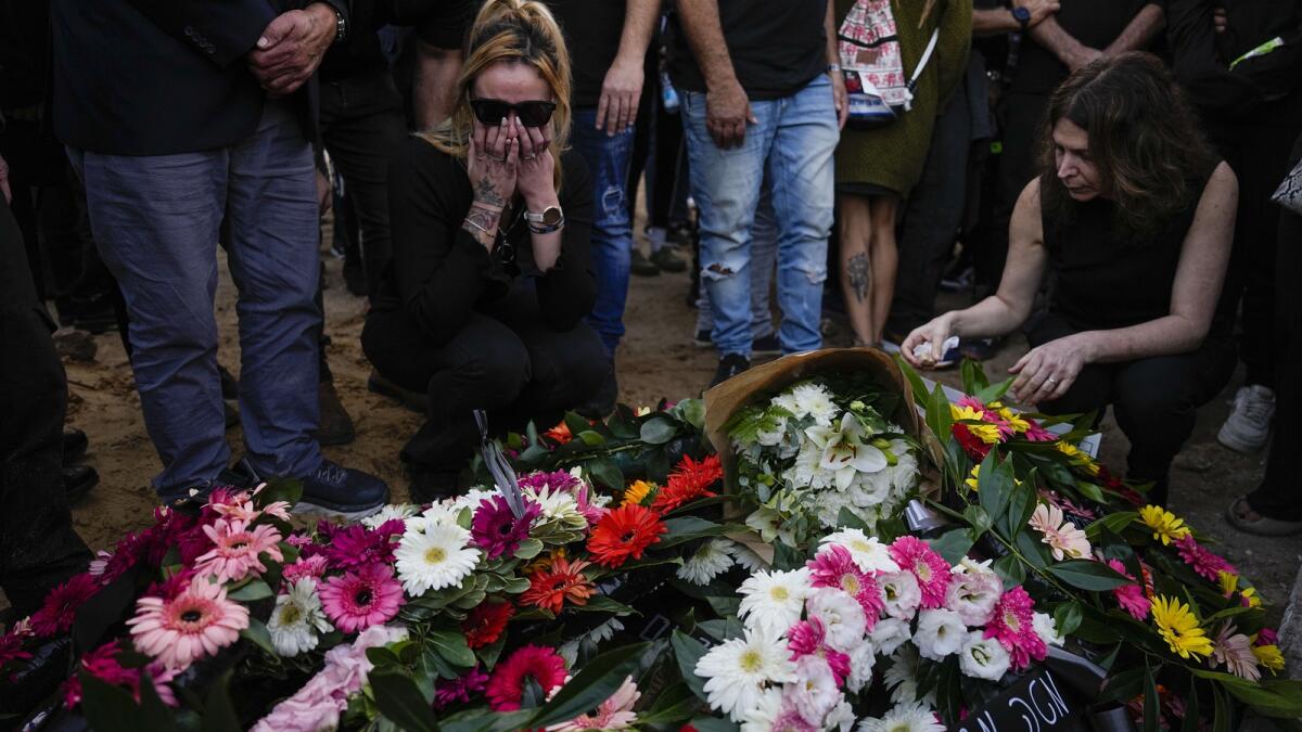 Mourners gather in grief during the funeral of Shani Gabay in the northern Israeli town of Yokneam, Thursday, Nov. 23, 2023. AP