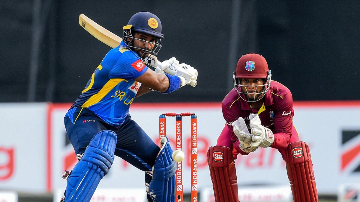 Sri Lanka's Kusal Perera (left) plays a shot during a one-day international against West Indies. (AFP)